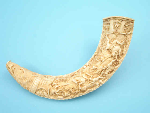 Exceptionally Carved Ivory Boar Tusk Powder Flask [probably French Dieppe, 19th-century]