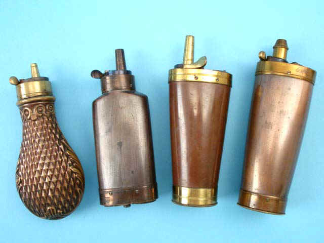 Lot of Four Assorted Powder and Ball Flasks.