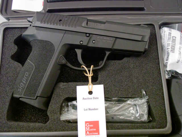 **Cased Sig Arms Model SP2340 Semi-Automatic Pistol