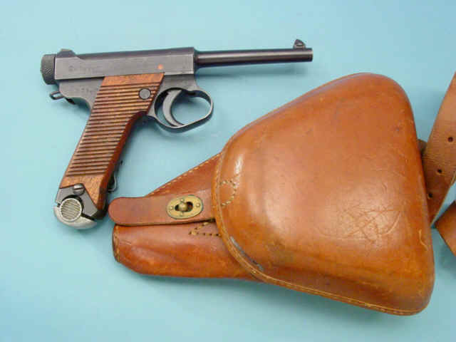 **Imperial Japanese Nagoya Arsenal Nambu Type 14 Semi-Automatic Pistol Together with Accompanying Brown Leather Military Holster