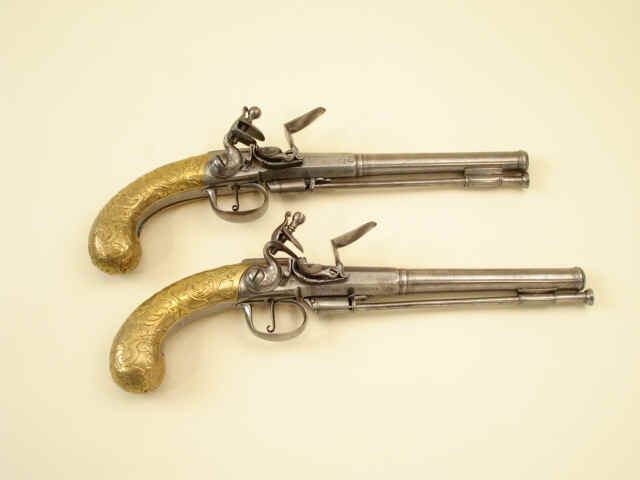Fine Pair of Brass Butt All Metal Flintlock Pistols Marked: Fontaine [early 18th-century]