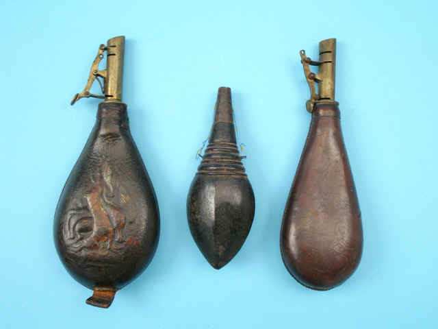 Lot of Two Shot Flasks and One Wooden Powder Flask