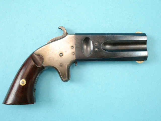 American Arms Company Double Barrel Swivel Breech Derringer, Smaller Frame Size with Two Calibers