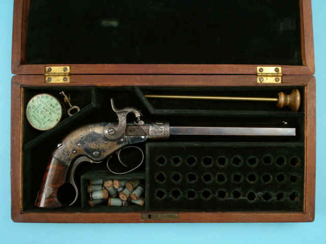 Rare and Fine Cased Exhibition Quality Engraved Serial No. 1 W.W. Marston Breechloading Pistol with Octagonal Barrel, Engraved by L.D. Nimschke