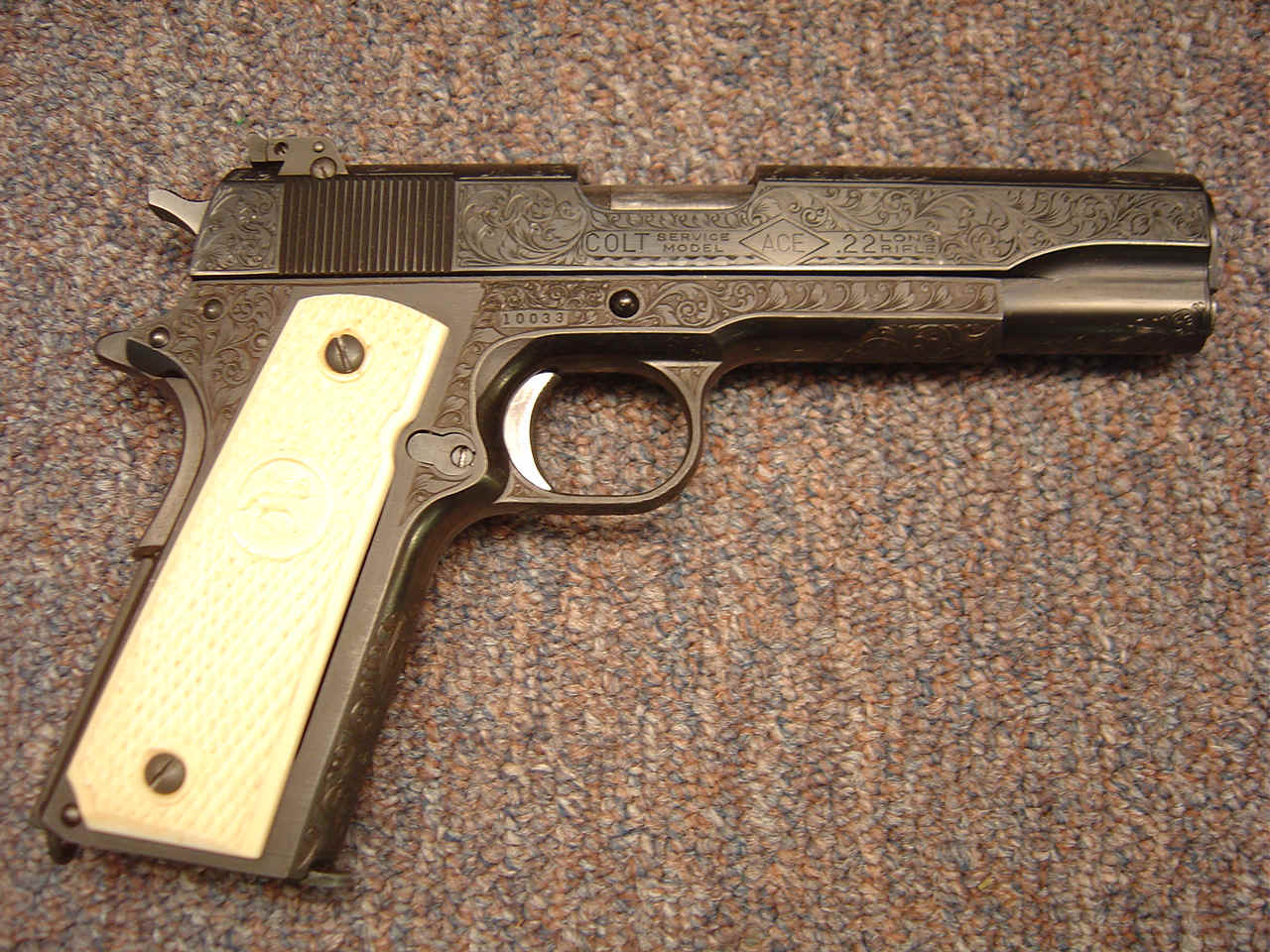 *Rare Profusely Engraved Colt Service Model Ace Semi-Auto Pistol, with Checkered Ivory Rampant Colt Grips