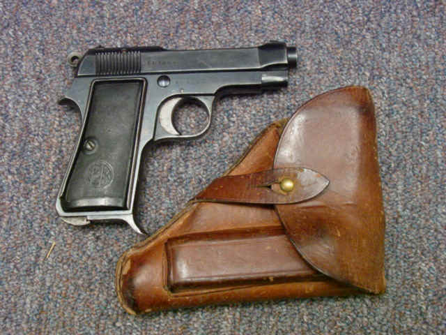 *P. Beretta Model 1934 Semi-Automatic Pistol, with Leather Holster and Extra Magazine