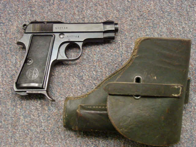 *Beretta Model 1934 Semi-Automatic Pistol with Extra Magazine and Black Leather Holster