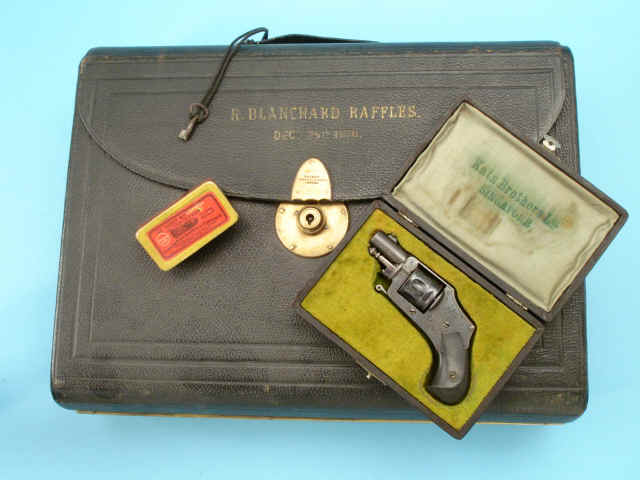 Cased Janssen Sons & Co. Belgian Vest Pocket Revolver, with Leather Traveling Business Case Gold-Embossed "R. BLANCHARD RAFFLES./DEC. 25th 1870"