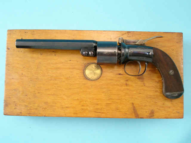 Fine and Scarce Cased T.K. Baker of London Single Action Percussion Revolver