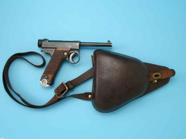 *Japanese Nambu Type 14 Semi-Automatic Pistol with Holster and Extra Magazine *Japanese Nambu Type 14 Semi-Automatic Pistol with Holster and Extra Magazine