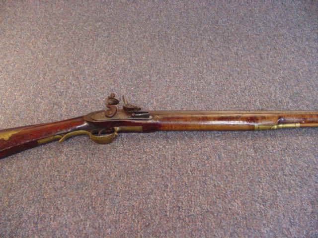 Elegant J.J. Henry Flintlock Kentucky Rifle, with Silver Inlaid Cheekpiece and Handsome Brass Patchbox