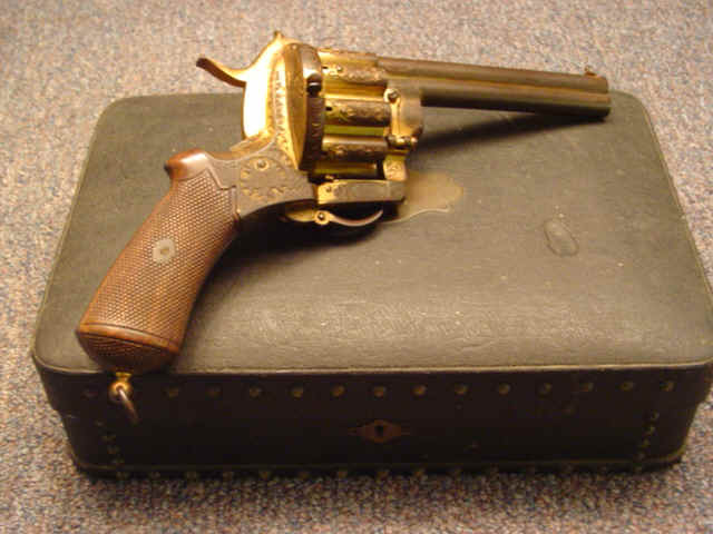 Cased Deluxe Lefaucheaux 20-Shot Single-Action Revolver, Profusely Engraved and with Gold-Washed Finish