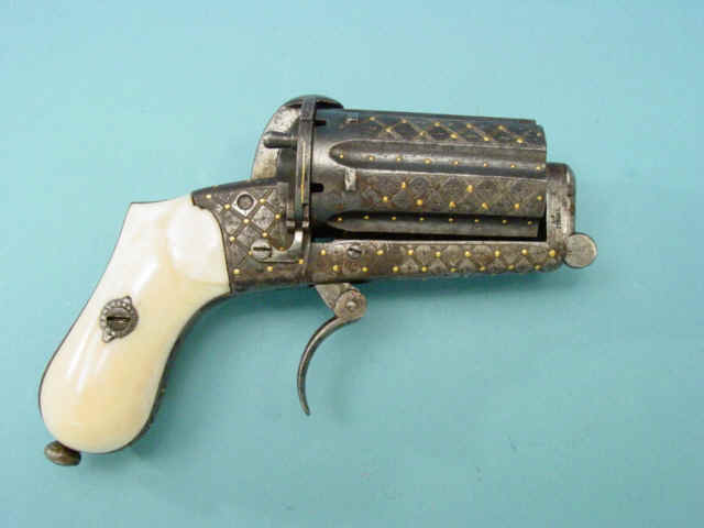 An Engraved and Gold Inlaid Belgian-Made Pinfire Pepperbox Pistol, with Ivory Grips