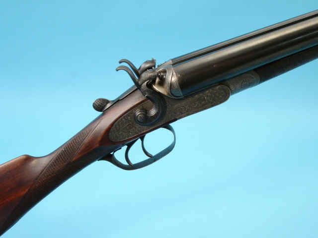 Cased 12 gauge W. Sumners Hammer Double Barrel Shotgun.