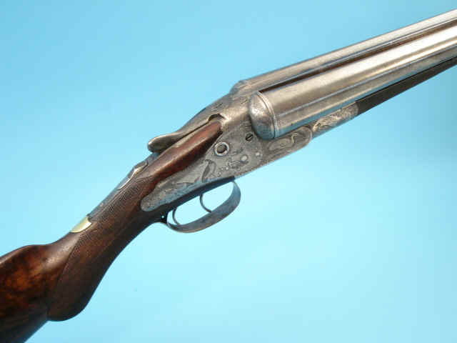 10 gauge W. & C. Scott Premier Grade Double Barrel Shotgun.