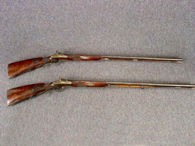 Rare Matched Set of Deluxe German Percussion Shotguns, Gold Inlaid and Silver-Mounted, by Moser of Munich, c. 1800, Converted c. 1835-40